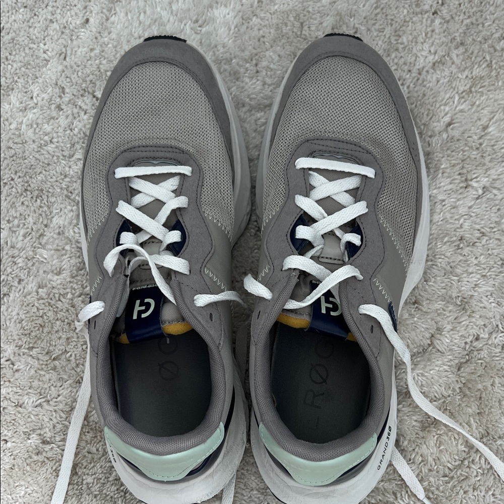 Gray and White Cole Haan Grand 360 running shoes